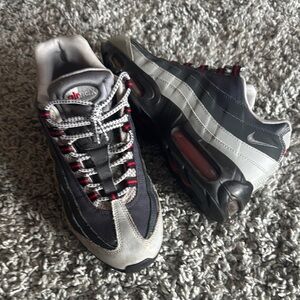Nike Black and Gray Sneakers with Striking Design